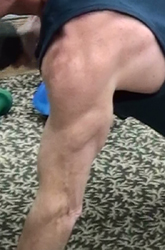 close-up picture of v-shape in triceps