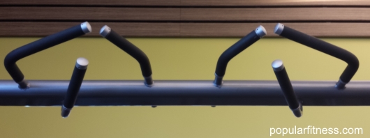 Pull-up handle bars on LifeFitness workstation with 3 bars