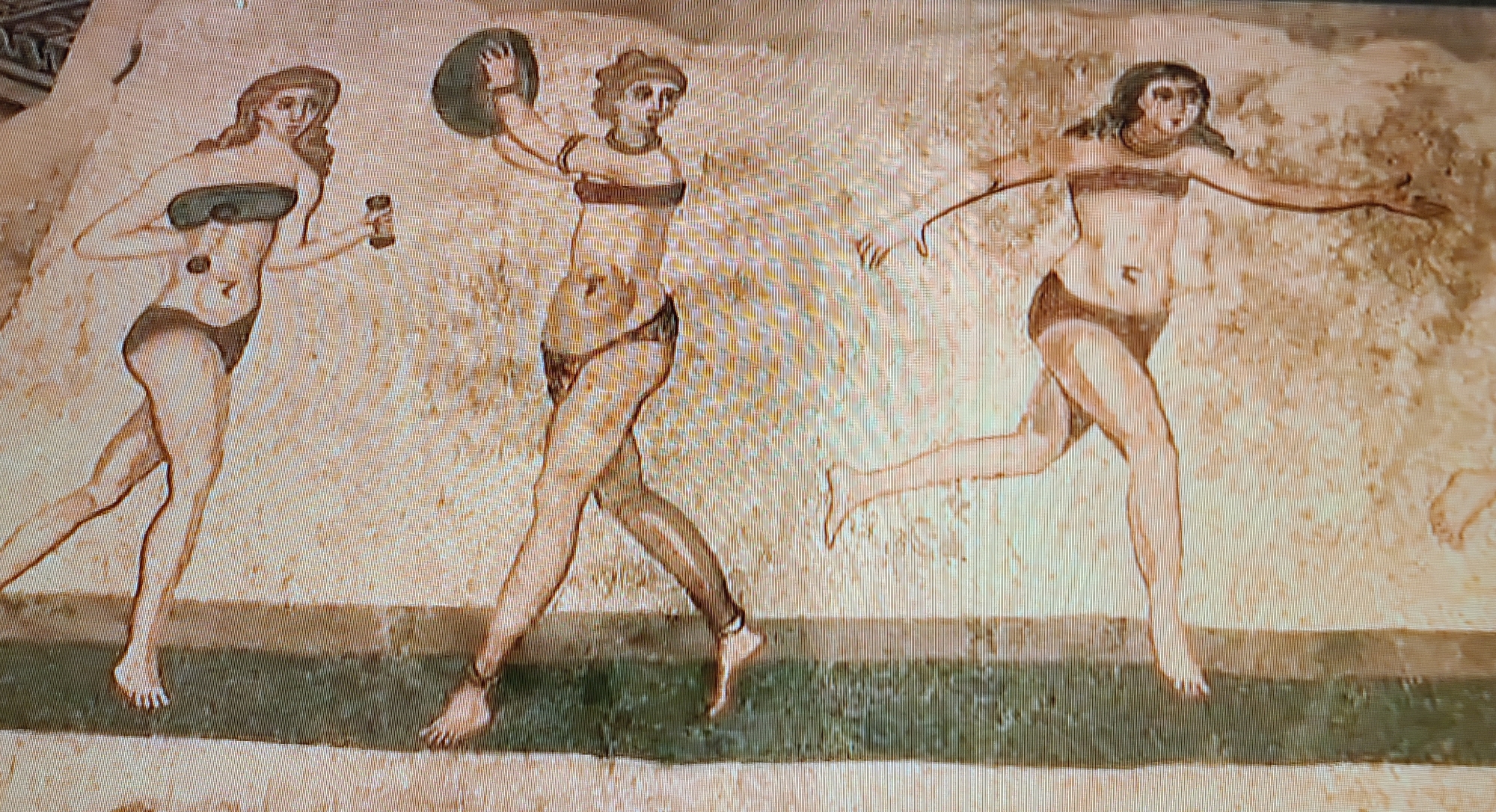 Roman female athletes competing in sports wearing bikinis mosaic