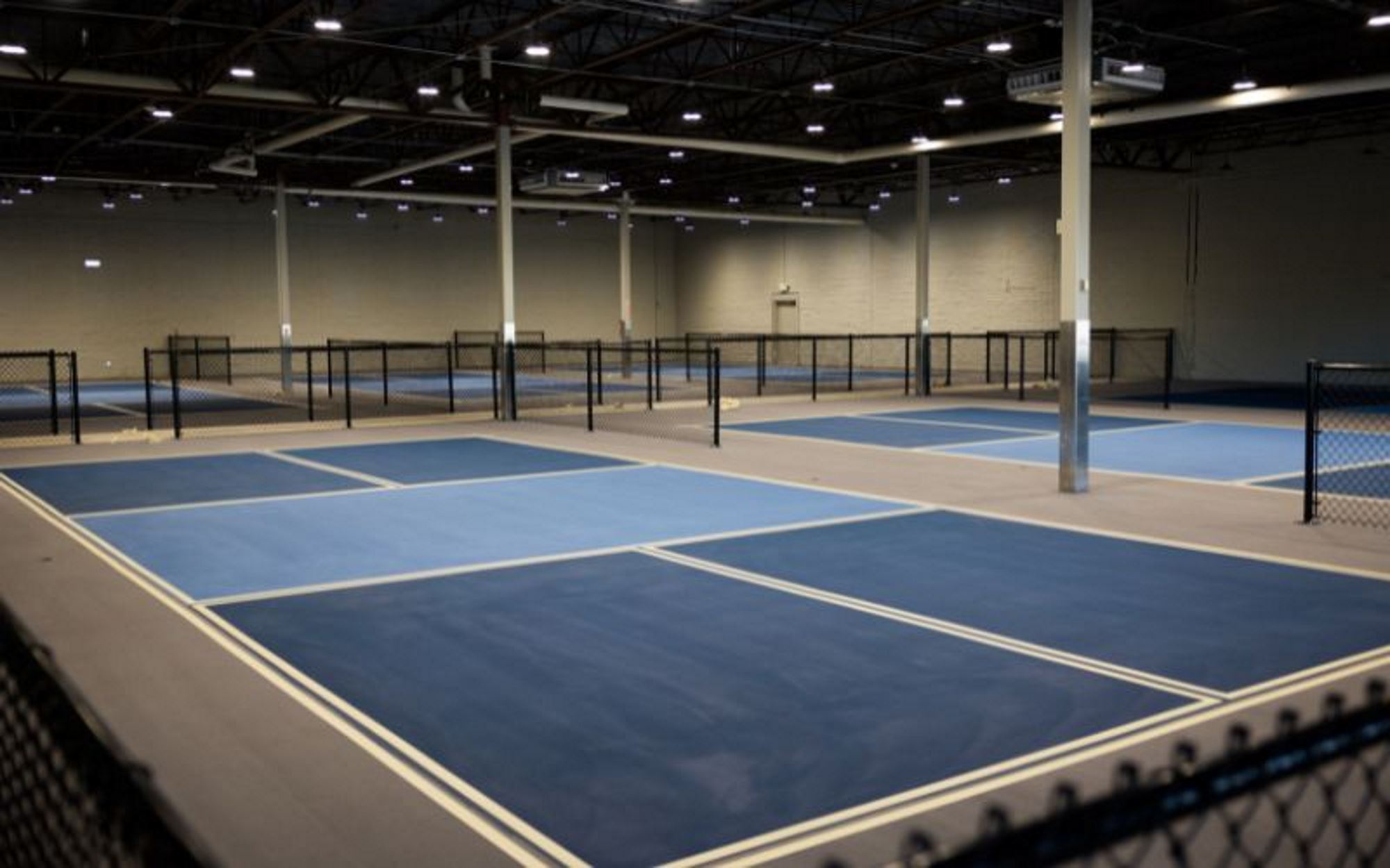 Fabric buildings for picklball courts.