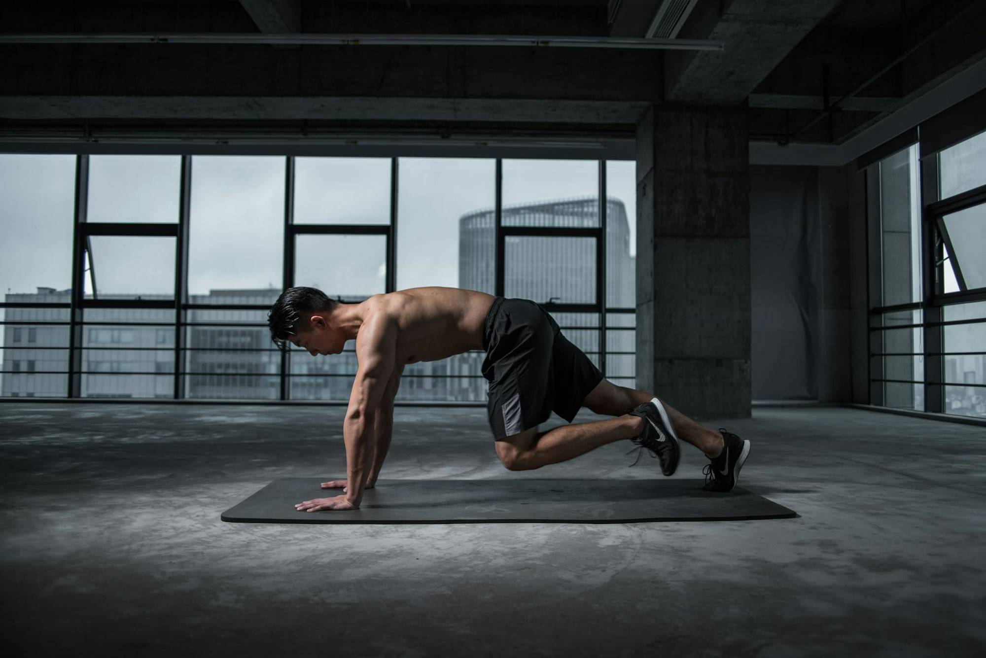 Man doing a bodyweight floor strength training exercise