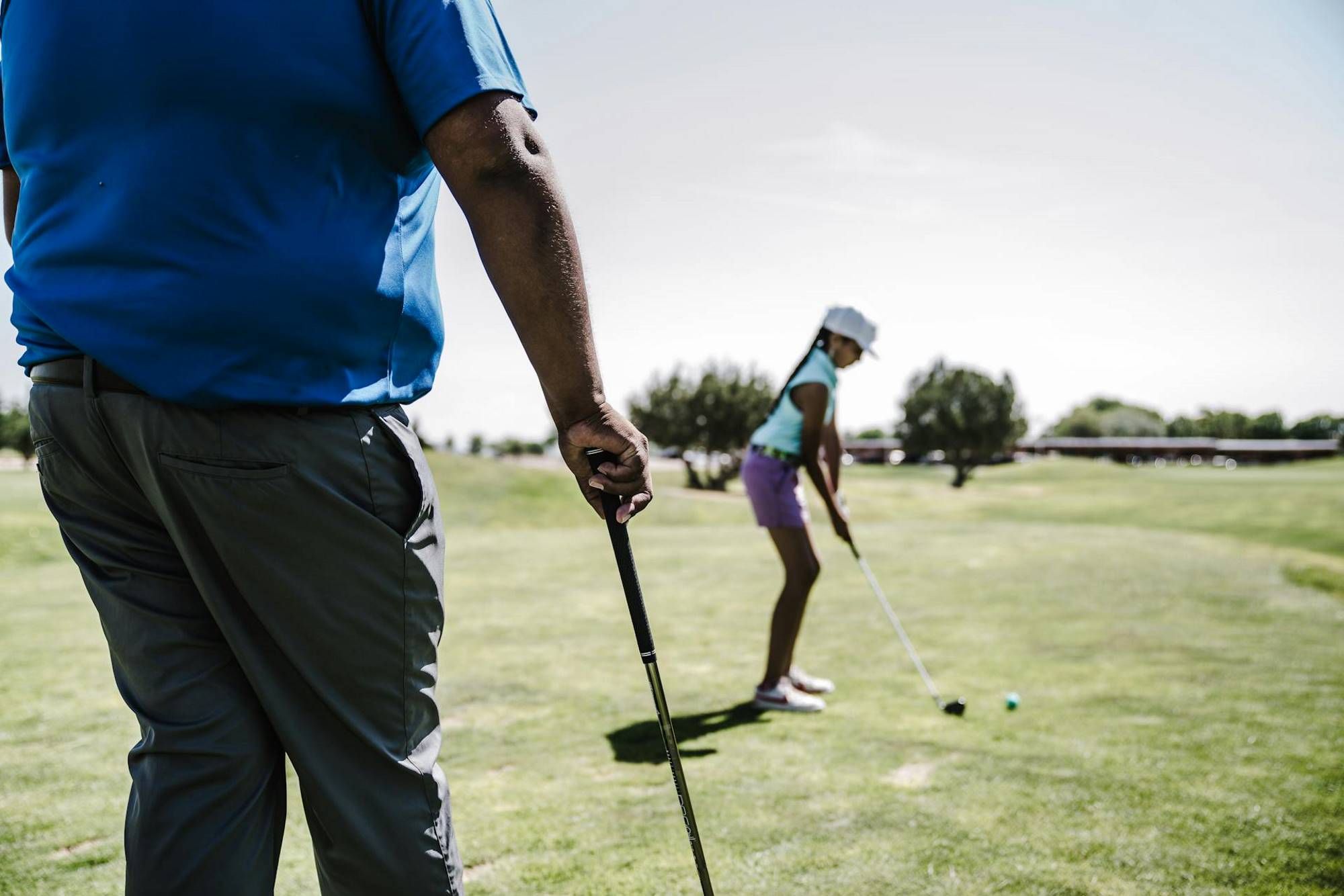 Woman playing golf