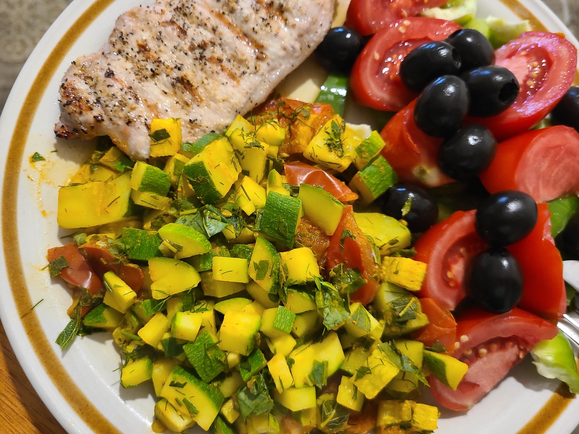 Sliced and cubed zucchini as a rice substitute for dinner.